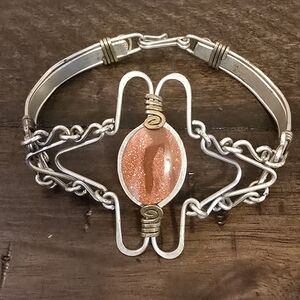 Silver and Gold Bracelet with Orange Gemstone